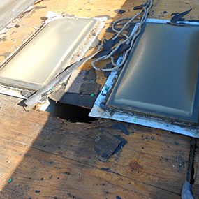 Before 1 - The Roof Coating Company multi-family roof repair williamsburg va